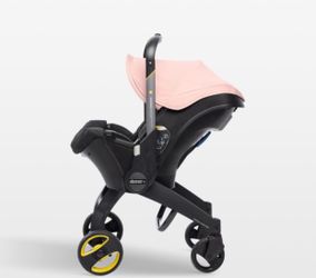 Pink doona stroller