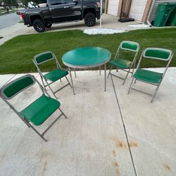 Vintage round green folding card table 36” round and four matching padded folding chairs