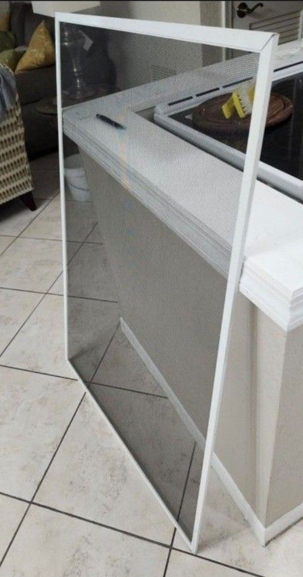 2-New Window Screens 33.5x 48in $,4.50- Each