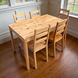 Table And Five Chairs 