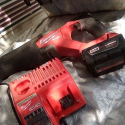 Milwaukee Sawzaw And Charger Plus Battery
