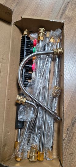 Pressure washer extension wands and nozzles