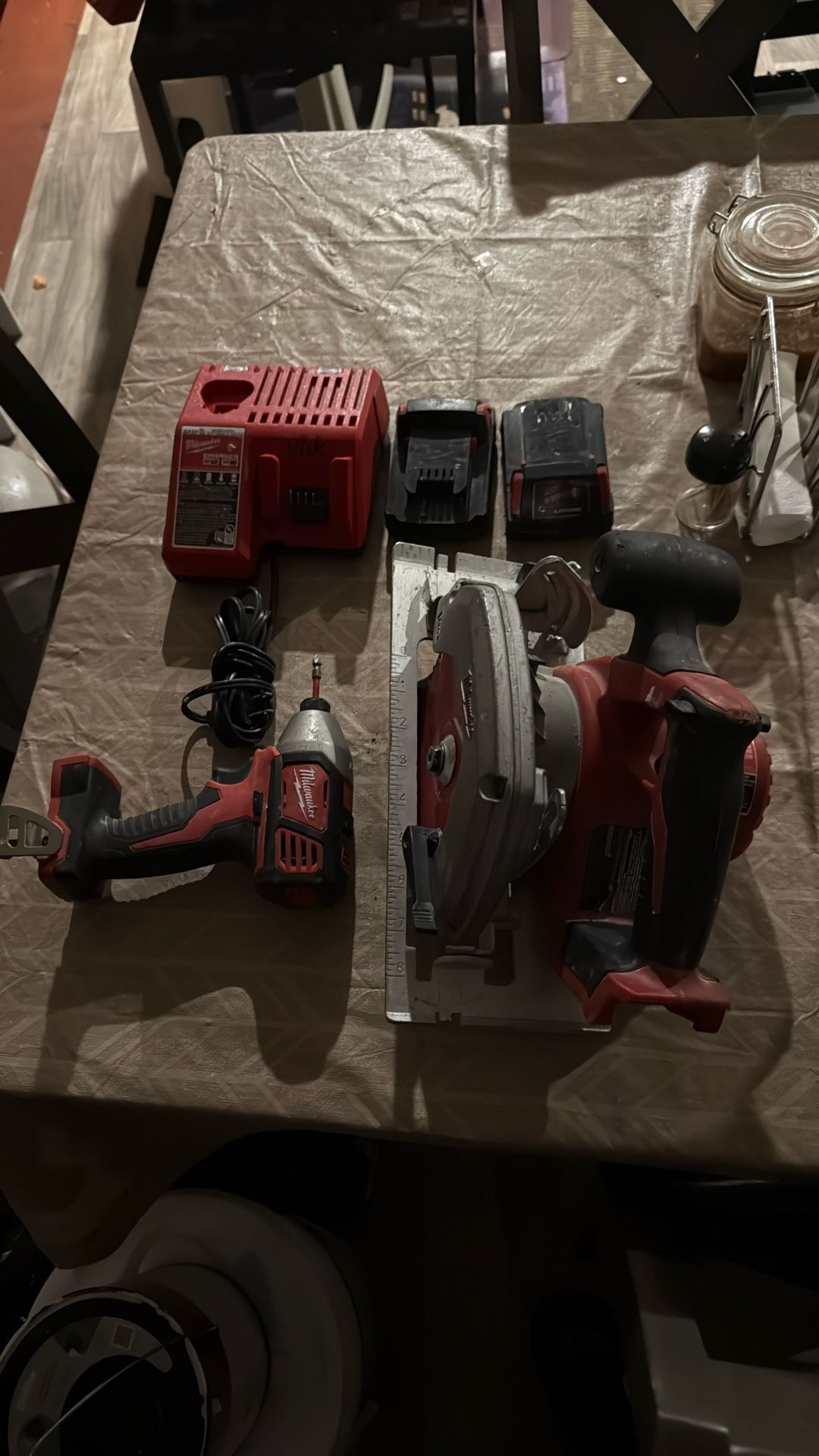 M18 Skill Saw, Impact Gun , Charger, 2 Battery
