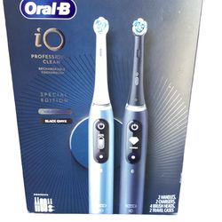 Oral-B iO Series 7 Electric Toothbrush, Black Onyx & Aquamarine, 4 Brush Heads, 2 pk.