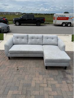 Couch with chaise- delivery available