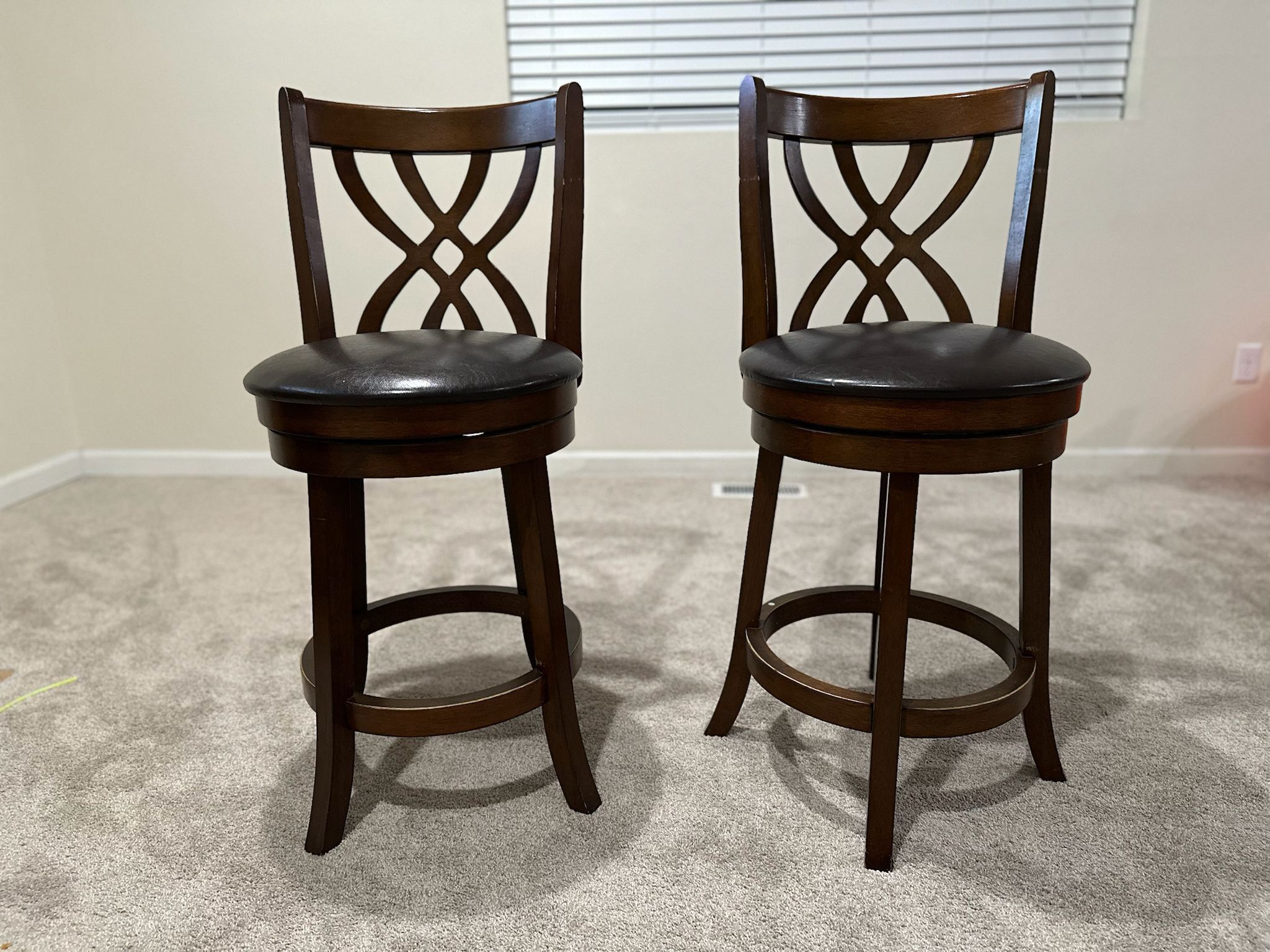 2 Countertop Height Swivel Chairs 