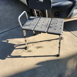 Adjustable height shower seat