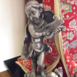 4 pewter angles