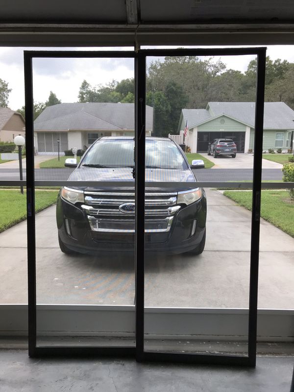 Patio glass sliding doors, 60 x 80. Brown trim for Sale in NEW PRT RCHY