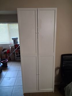 Tall White Storage Cabinet with Four Doors