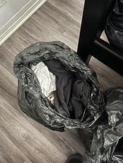 Bags full of assorted clothes $1 each