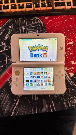 Pink 3ds XL with Pokemon bank and 75+ games