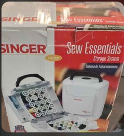 Brand new  singer essentials storage system in box.  ( also there is stuff in box ). Also has price on box .