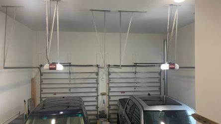 Overhead Garage Door Spring Opener Off Track Adjustment Replace And Parts 
