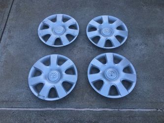 Toyota Wheel Covers Qty: 4 16.5 inch diameter with 14 in wire diameter