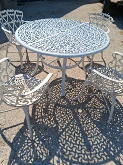 Mesa de patio con 4 sillas