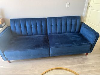 Velvet blue sofa (if it’s up it’s available)
