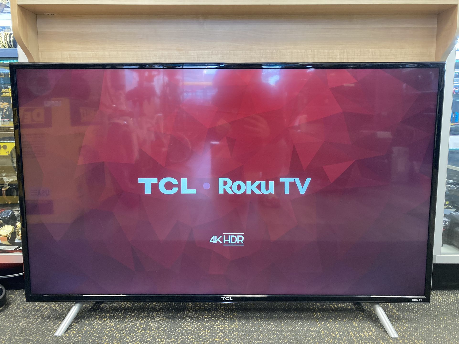 TCL 49” CLASS 4-SERIES 4K UHD HDR ROKU SMART TV