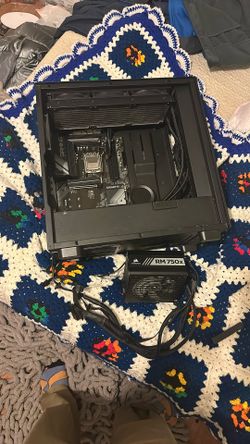 nzxt case (without glasse panel), with a nzxt kraken 360 aio, with power supply and motherboard for am5