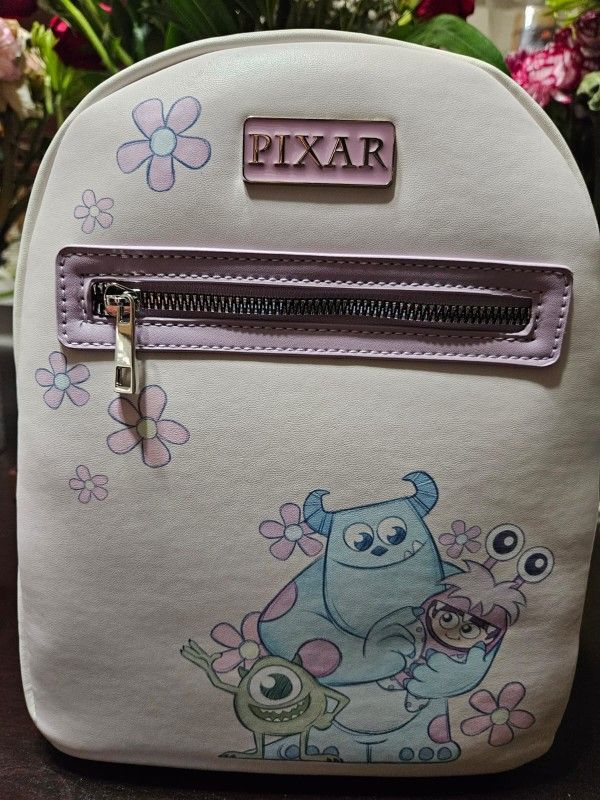 Loungefly Disney Pixar Monsters Inc Mini Backpack Characters Doors Pattern  Bag for Sale in Boynton Beach, FL - OfferUp