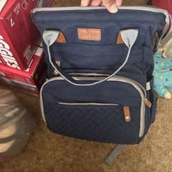 Diaper Bag And Baby Clothes