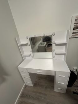White vanity  with outlets and multiple draws
