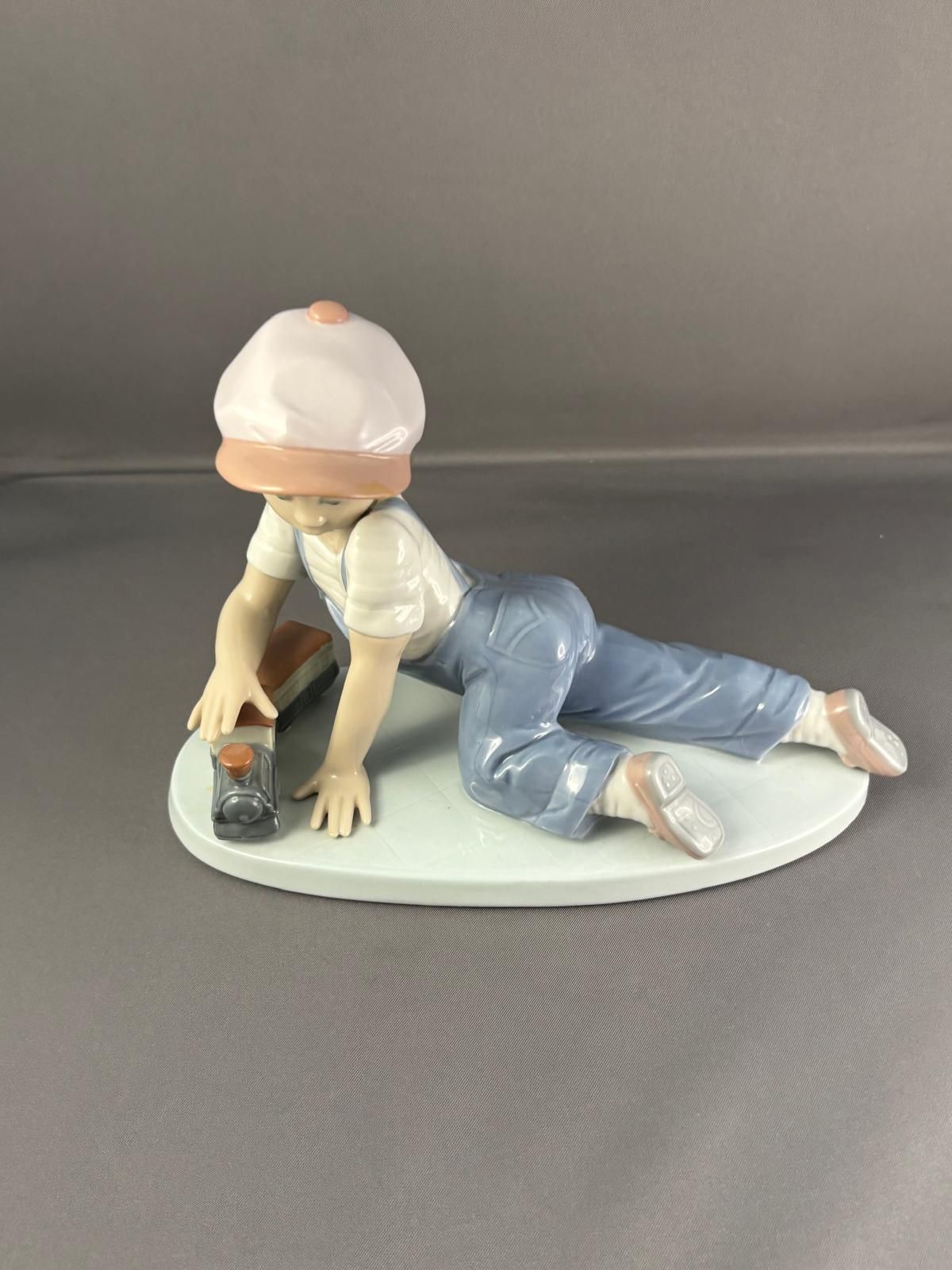 Lladro Figurine: All Aboard 1992 A Boy Playing Train #7619