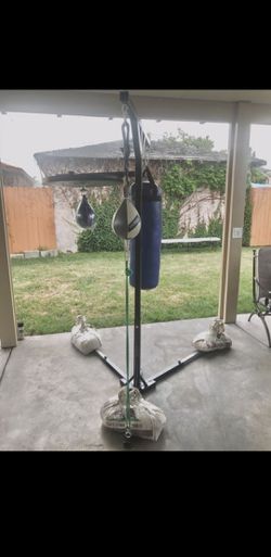 Punching bag stand with heavy bag speed bag double ended bag