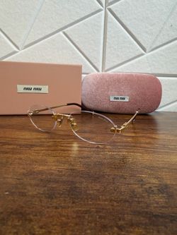 Miu Miu Rimless Gold Eyeglasses