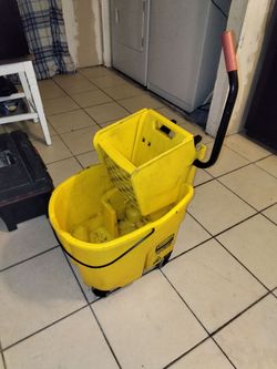Very nice mop bucket with w r i n g e r commercial