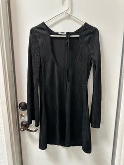 black Princess Polly minidress features long flared sleeves and a dramatic open back size M