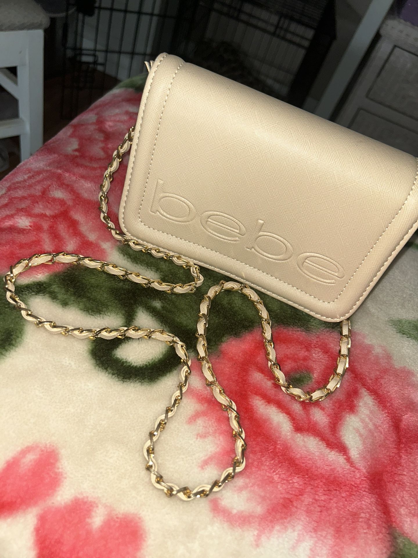 Tan Bebe purse.