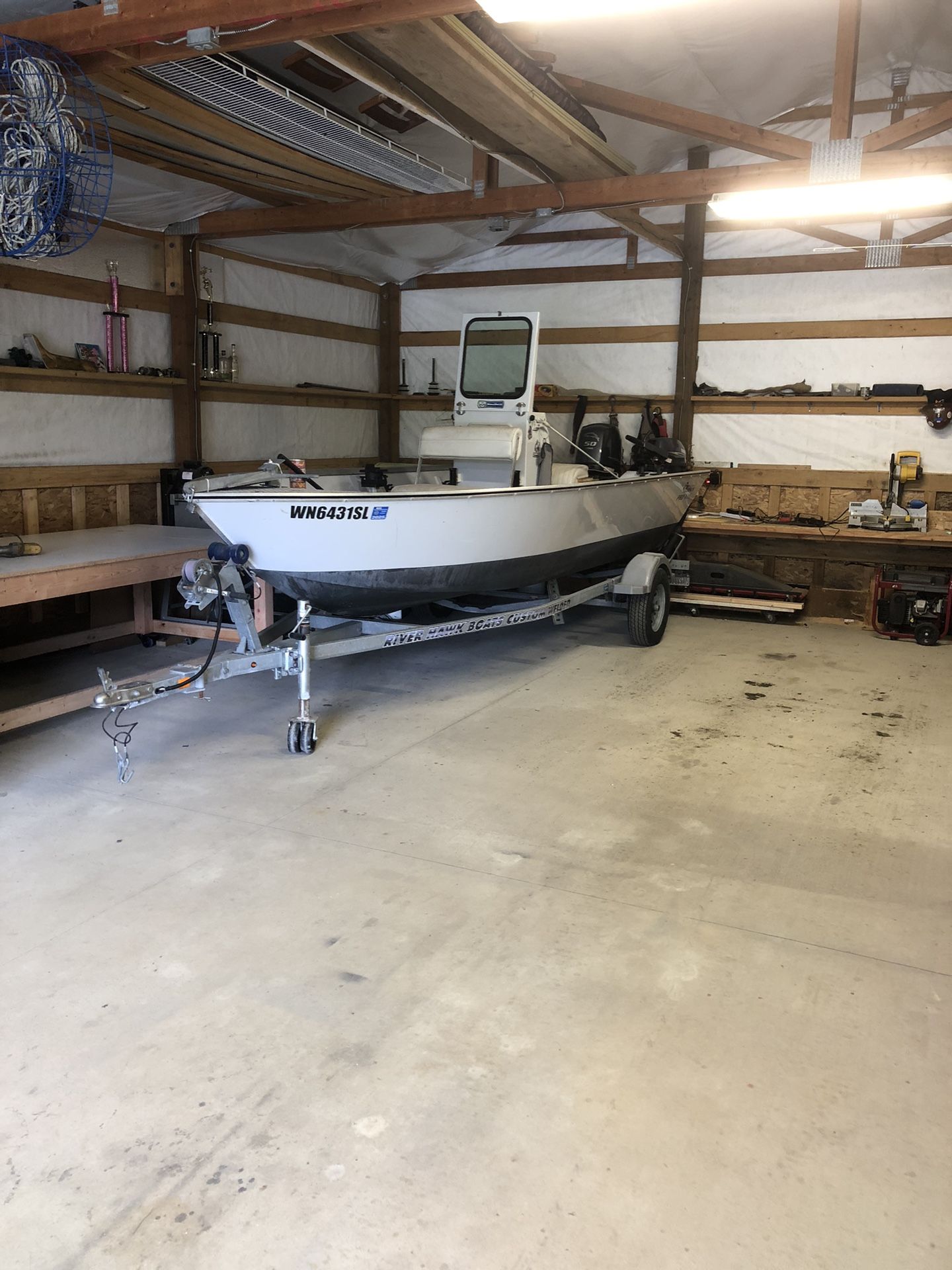 2018 River Hawke 16’ Center console with floor.
