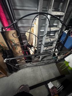 Black Wrought Iron Bed Frame with Scrollwork