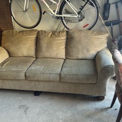 Beautiful tan Colored sofa with (2) Chairs