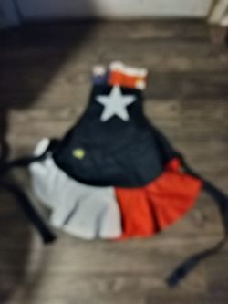 Texas Flag Apron with a prominent white star and yellow rose embroidered