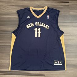 Adidas Jrue Holiday #11 New Orleans Pelicans NBA Basketball Jersey Men’s XL  100% authentic. Good condition. Lightly worn.   The product is an officia