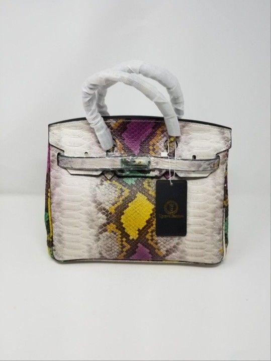 100% Genuine leather handbag from cow leather emboss in a snake skin texture design.