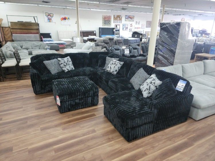 New 4pc Black Corduroy Sectional. Ottoman Priced Separately