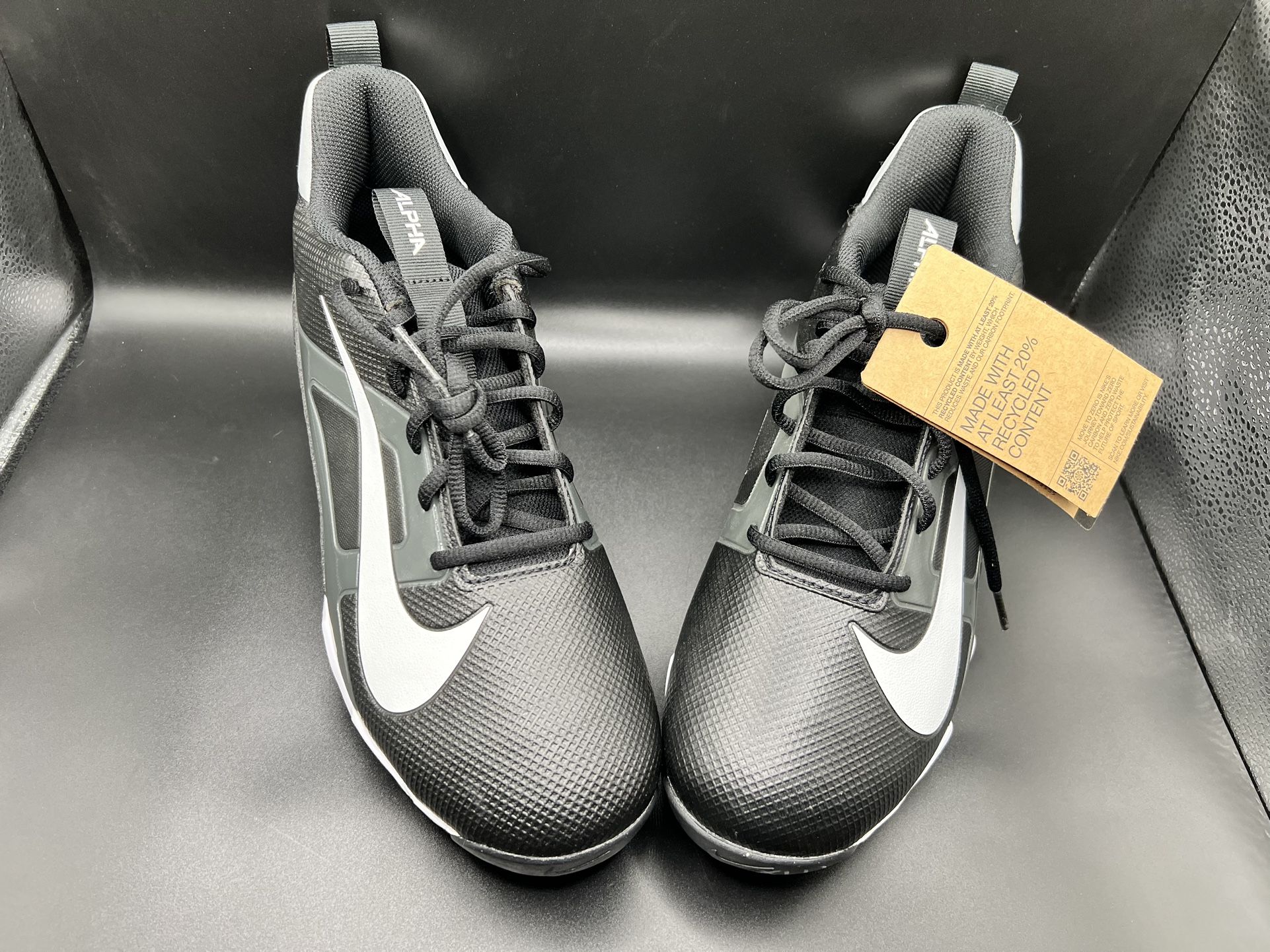 Nike Alpha Menace 4 Shark football cleats in black, white, and light smoke grey