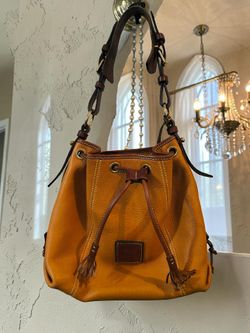 Dooney & Bourke Pebble Grain Drawstring Bucket Bag Tan Brown Tassel Leather Shoulder Bag