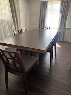 Solid Wood Dining Table with 6 Chairs $650