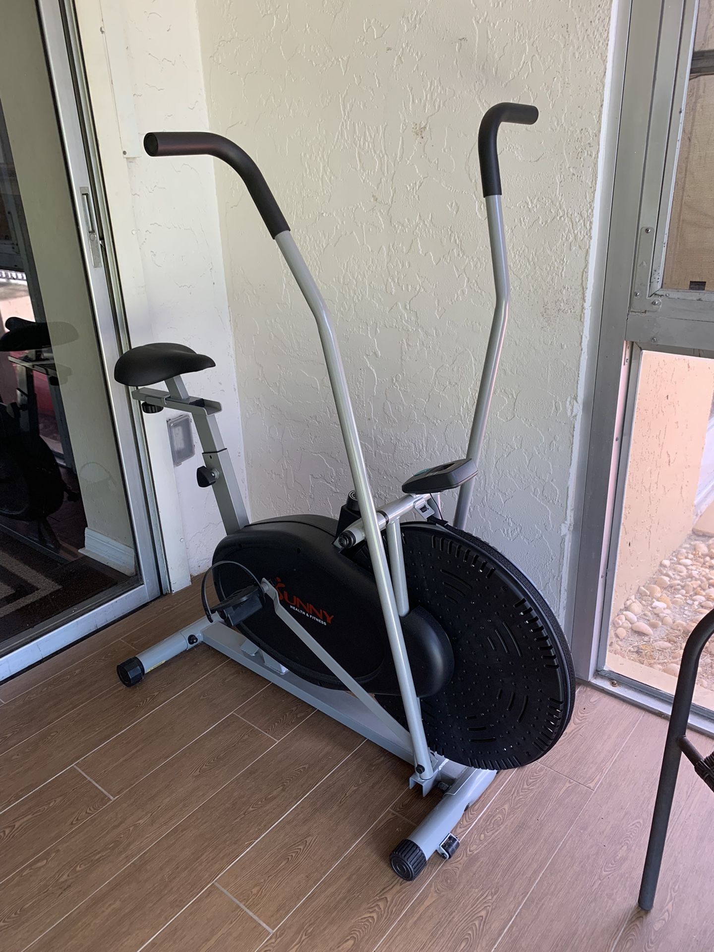 Sunny Health & Fitness Motion Strap Bike