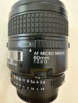Nikon AF Micro-Nikkor 60mm f/2.8D macro lens, fitted with a 62mm Promaster UV filter.