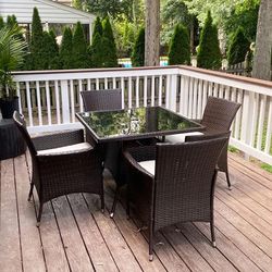 (NEW) $250 (5pcs) Wicker Dining Set Outdoor Patio Furniture 35x35” Glass Table with Umbrella Cutout, 4 Chairs