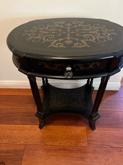 Black Oval Accent Table with Gold Stencil