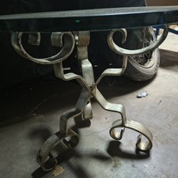 wrought iron and glass occasional table.
