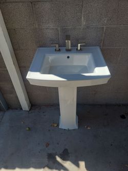Kohler pedestal sink including faucet