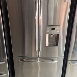GE Stainless Steel Refrigerator And Freezer