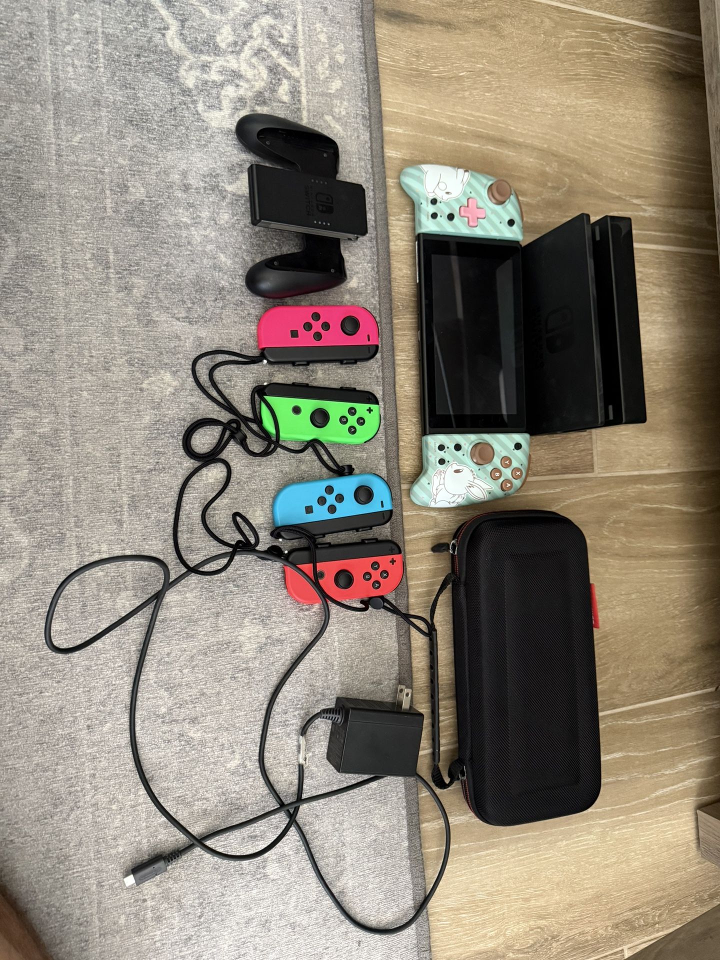 Nintendo Switch W/ Extra Joy Cons/ Hori Grips. Carrying Case